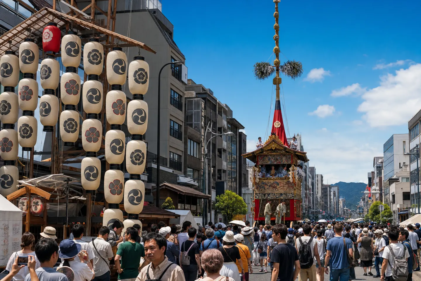 Lantern-lit festival float moving through a crowded Kyoto street